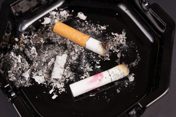 cigarette butts in an ashtray
