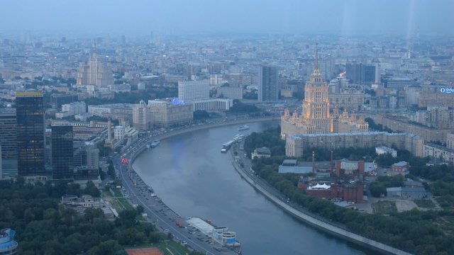 White house and hotel Ukraine stands on bank of river
