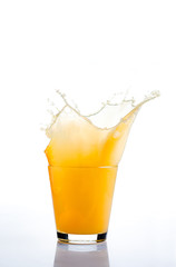 Fototapeta na wymiar Orange juice splash