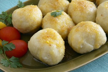 Fototapeta premium potato dough dumplings with grinded meat inside