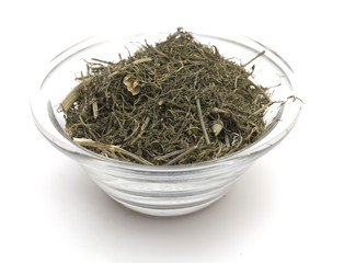 dried dill in a glass bowl