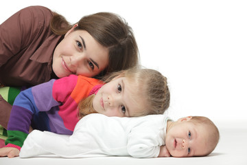 Mother lying on the floor with her two kids