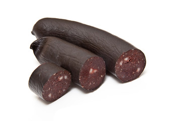 Black pudding sausage on a white studio background.