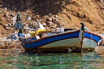 Small boat on the shore