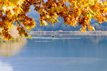 Lake and man on boat