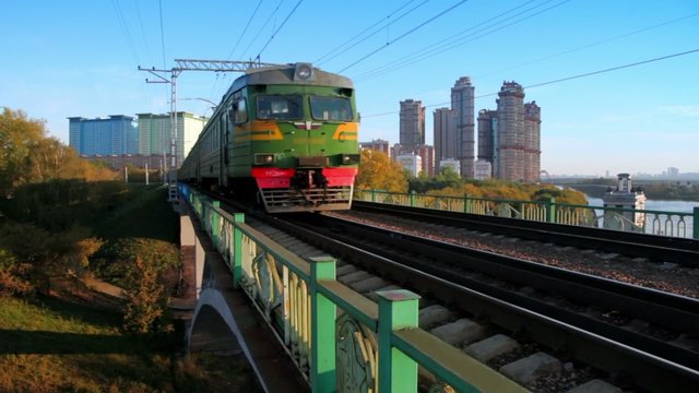 Train passes by on railway bridge