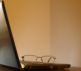Glasses on the laptop.