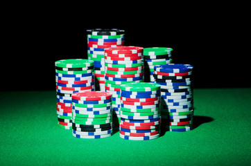 Stack of casion chips on table