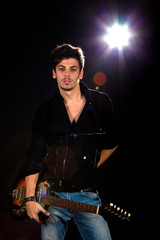 Cool man with electric guitar