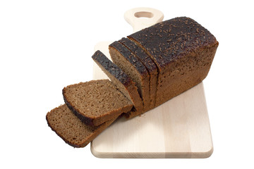 cut black bread on a board.