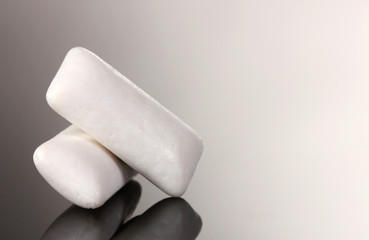 Chewing gums on gray background