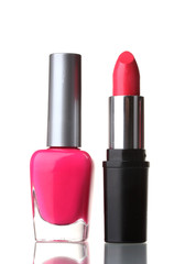 Pink lipstick and nail polish isolated on white background