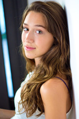 portrait of happy young woman at home