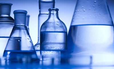 Test tubes on blue background