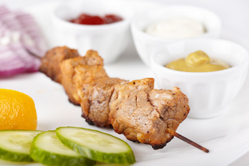 Pork shashlik with fresh vegetables