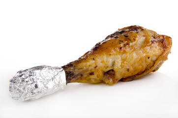 one golden brown fried organic chicken leg