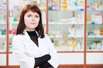 Pharmacy chemist woman in drugstore