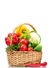 Fresh vegetables in basket isolated on white