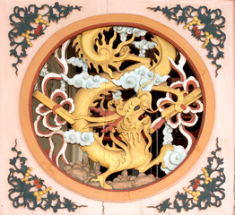 Chinese Dragon Emblem on Entrance of Old Temple