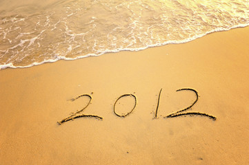 2012 new year message on the sand beach