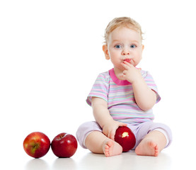 Fototapeta na wymiar Baby boy eating healthy food isolated