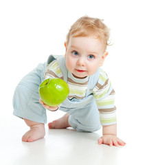 Fototapeta premium Baby boy eating healthy food isolated