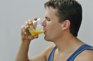 Fototapeta premium Athlete drinking egg