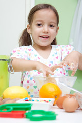 little girl cooking in the kitchen