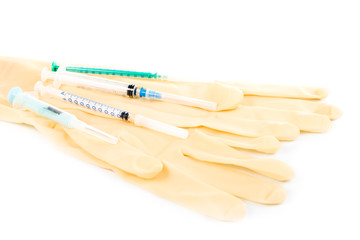 Medical gloves and syringes.