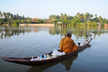 Fototapeta na wymiar Buddhist monk in boat