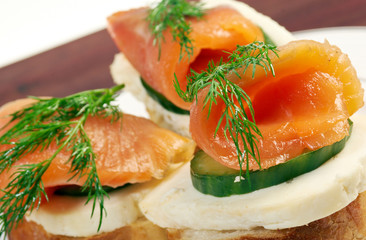 Canapes with smoked salmon  cheese and cucumber