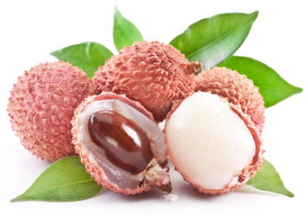 Lychee with leaves on a white background.