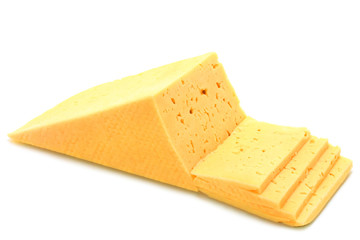 Cut piece of cheese on a white background