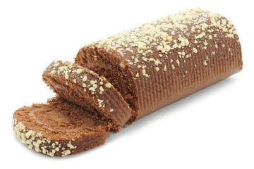 Chocolate Swiss roll closeup on a white background