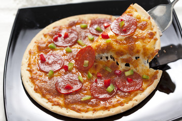 Slice of pepperoni pizza