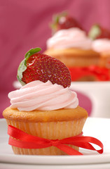 Delicious Vanilla cupcake with strawberry frosting
