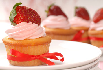 Delicious Vanilla cupcake with strawberry frosting