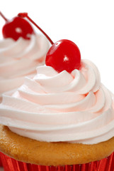 Vanilla cupcake with maraschino frosting and cherry