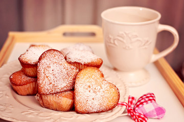 heart shaped muffins with coffee