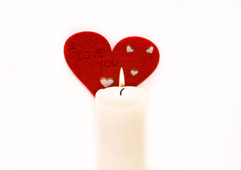 candle and a red heart
