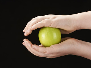 Childs hands with apple