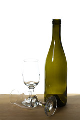 WIne bottle on a table with glasses