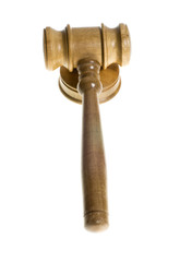 Wooden gavel on strike plate isolated