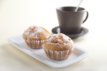 Two cakes with tea
