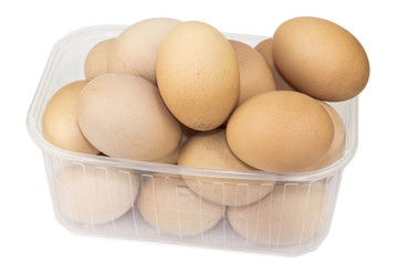 Chicken eggs in a plastic container on a white background. #1