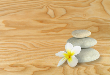 Fototapeta na wymiar Peble stones on wooden surface