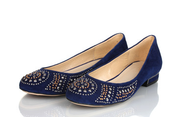 Elegant blue flat shoes for women in stones isolated on white