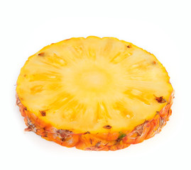 Pineapple slice isolated over white background.