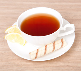 Tea with lemon and cookie