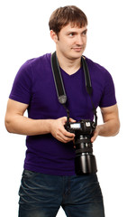 Male studio photographer at work